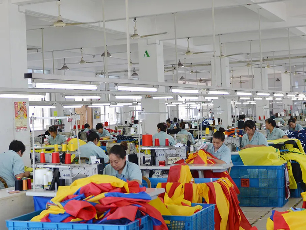 Industrial sewing line for flags and banners