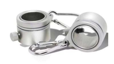 Pair of metal flag rings used as hardware on flag poles for garden displays